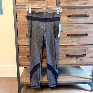 NWT lululemon Inspire Tights Size 4. Black and gray.